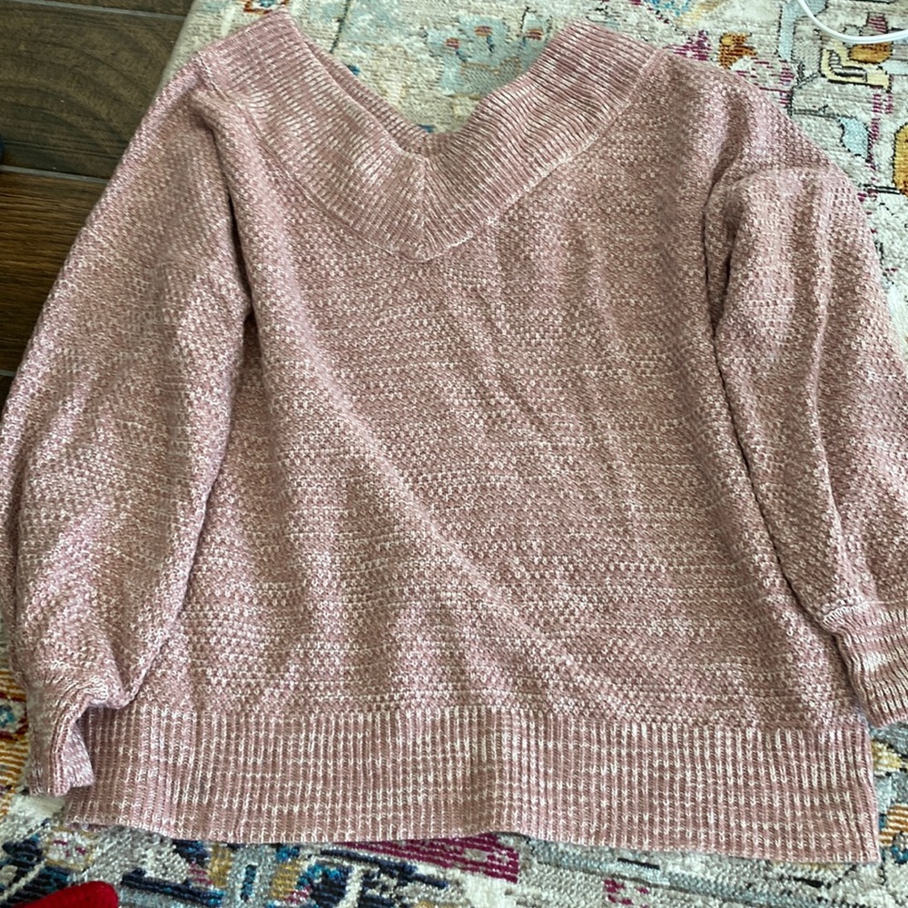 V neck sweater can be worn over the shoulder